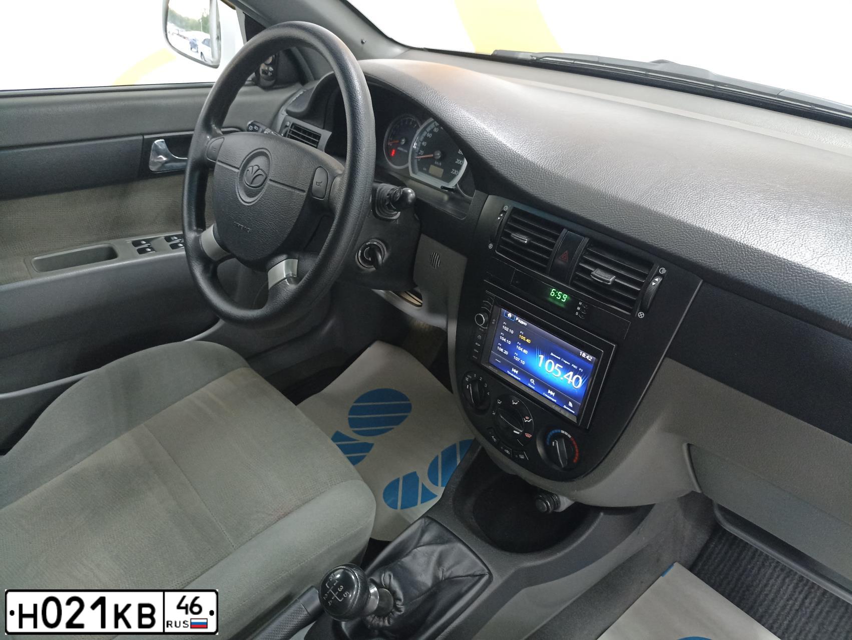 Фото автомобиля DAEWOO GENTRA, 2013 — госномер В559НА136. Цвет: БЕЛО-ДЫМЧАТЫЙ