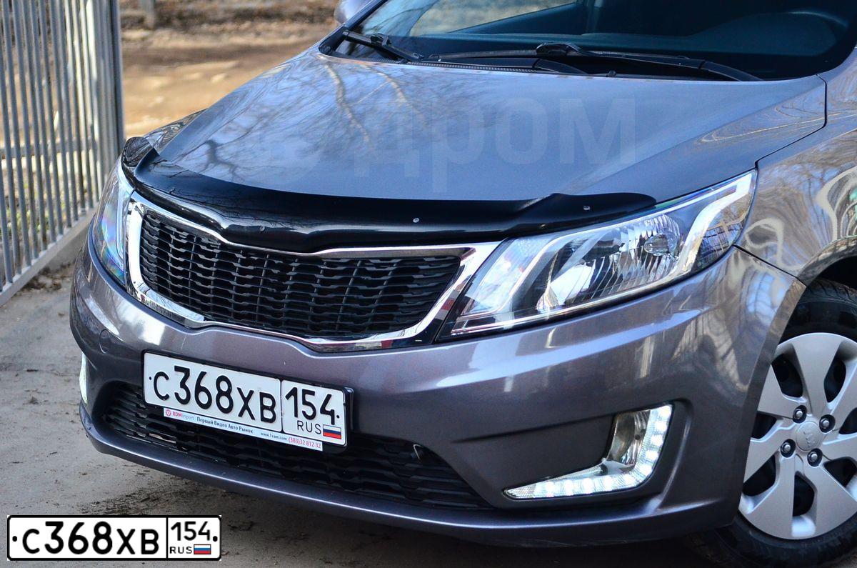 Фото автомобиля KIA RIO, 2013 — госномер Н168ЕВ154. Цвет: Серый