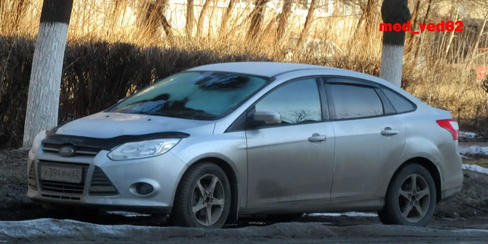 Фото автомобиля FORD FOCUS, 2012 — госномер У394РН62. Цвет: Серебристый
