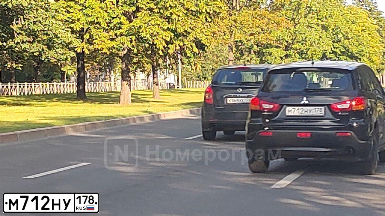 Фото автомобиля MITSUBISHI ASX, 2012 — госномер М712НУ178. Цвет: ЧЕРНЫЙ