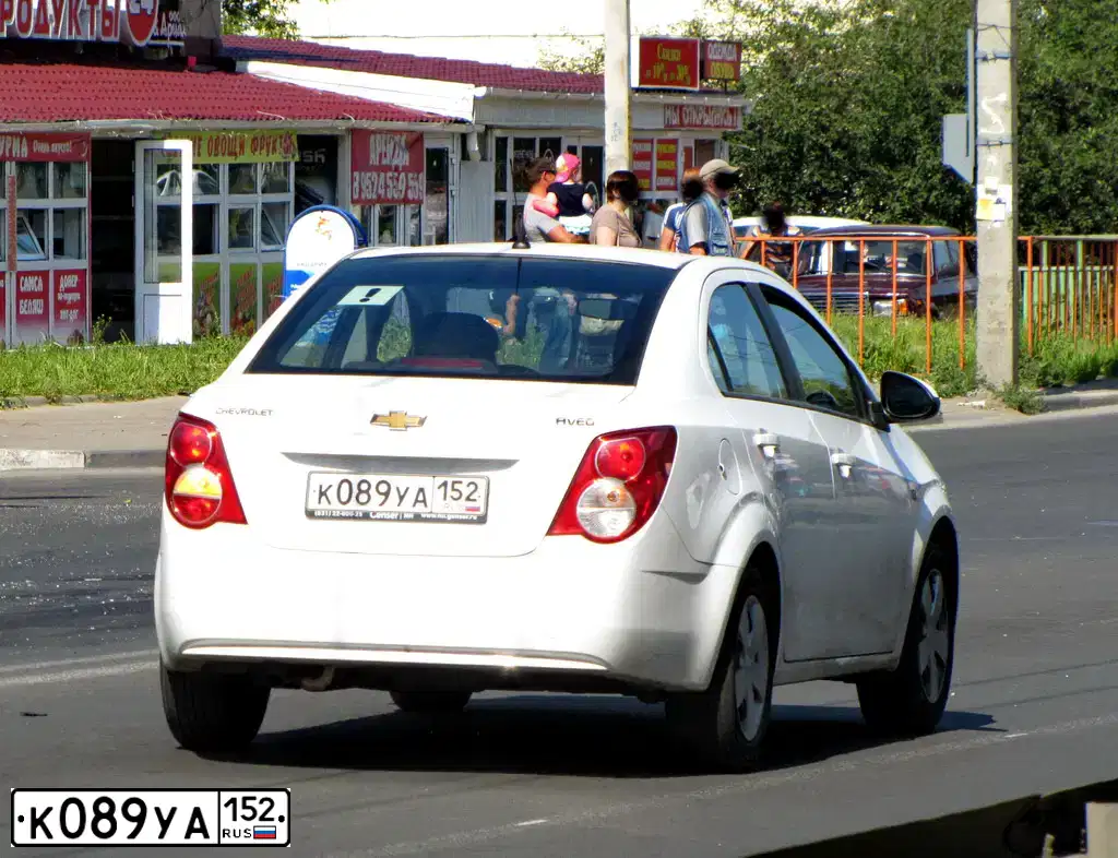 Фото автомобиля CHEVROLET AVEO, 2012 — госномер К089УА152. Цвет: БЕЛЫЙ