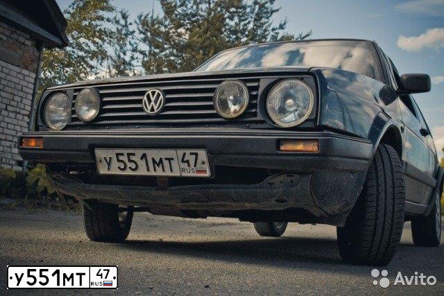Фото автомобиля VOLKSWAGEN GOLF, 1991 — госномер У551МТ47. Цвет: ТЕМНО-СИНИЙ
