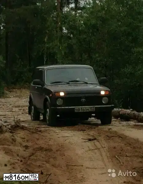Фото автомобиля LADA 2121 NIVA, 2013 — госномер О654ТО33. Цвет: ТЕМНО-ВИШНЕВЫЙ