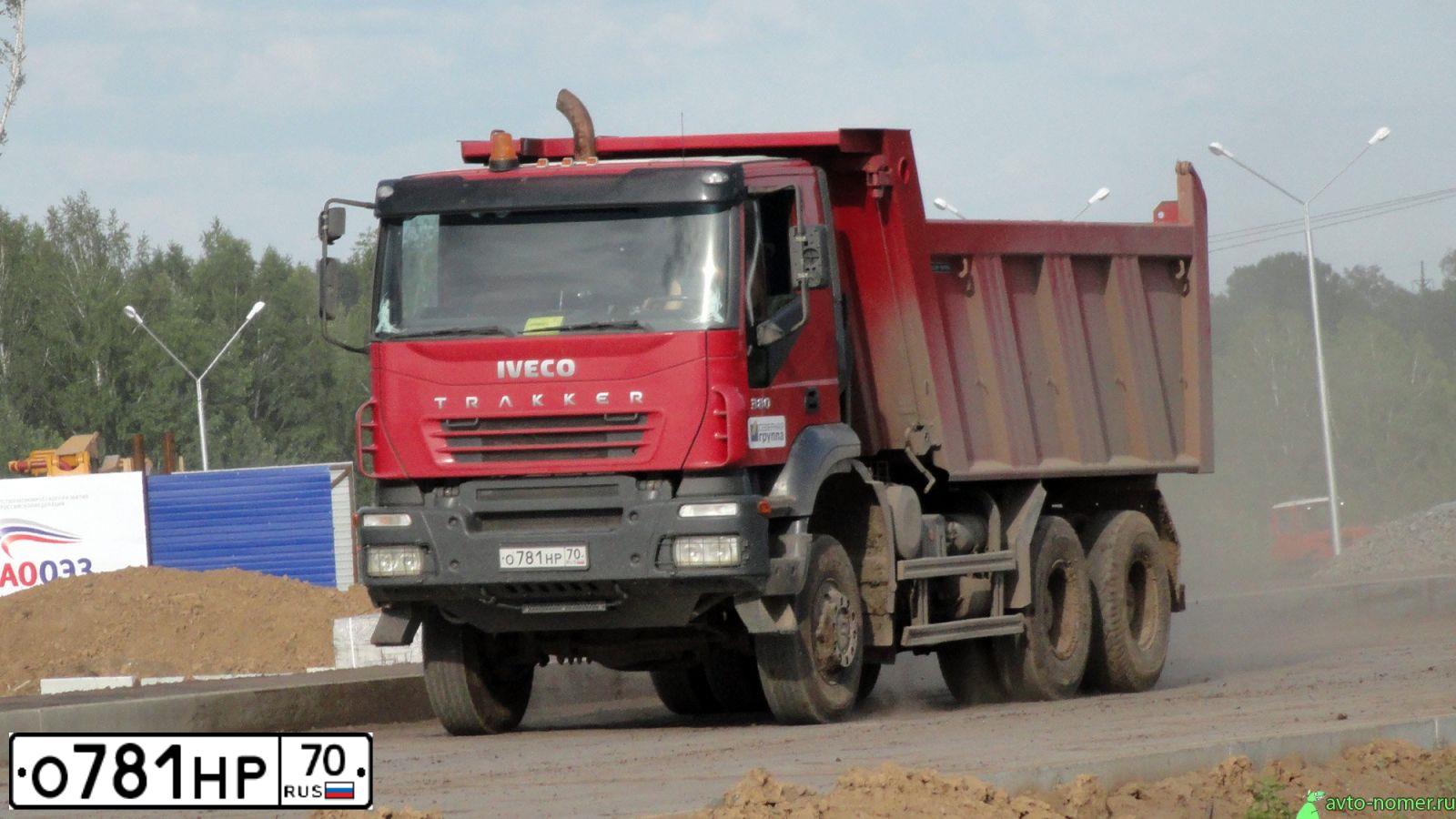 Фото автомобиля IVECO EUROTRAKKER/TRAKKER, 2008 — госномер К912РК70. Цвет: Красный