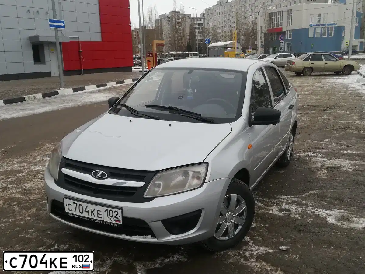 Фото автомобиля LADA 2191 GRANTA, 2015 — госномер Х334ОК102. Цвет: ЖЕЛТО-СЕРЕБРИСТЫЙ