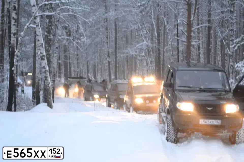 Фото автомобиля UAZ 3163 PATRIOT, 2012 — госномер Е565ХХ152. Цвет: ЧЕРНЫЙ