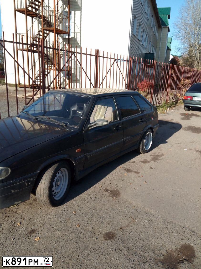 Фото автомобиля LADA 2114 SAMARA, 2008 — госномер К891РМ72. Цвет: ТЕМНО-ЗЕЛЕНЫЙ