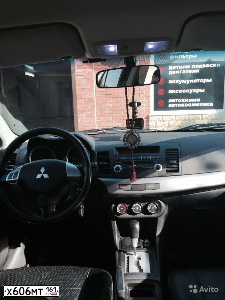 Фото автомобиля MITSUBISHI LANCER, 2010 — госномер В043ЕО193. Цвет: ЧЕРНЫЙ