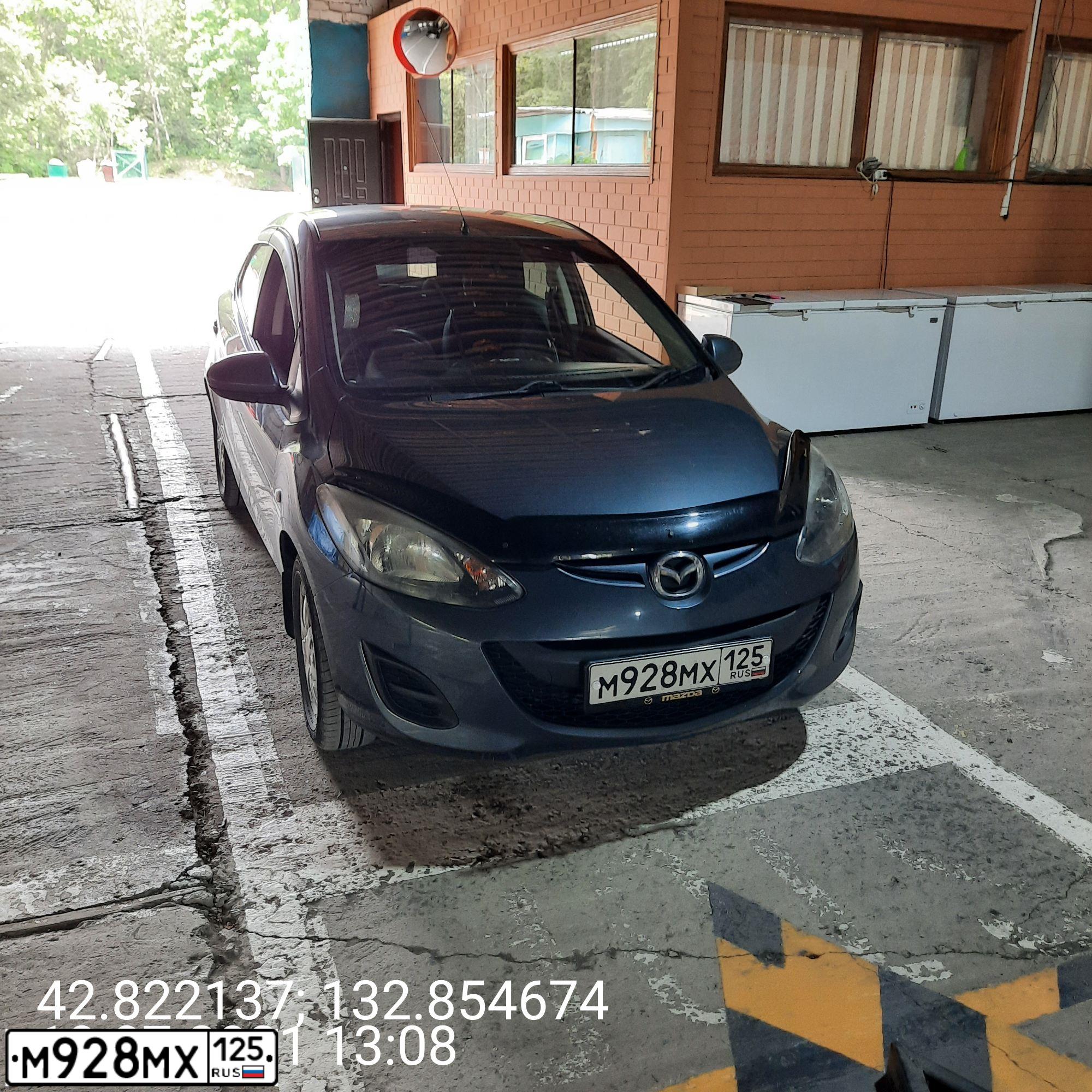Фото автомобиля MAZDA DEMIO, 2011 — госномер Р438СР27