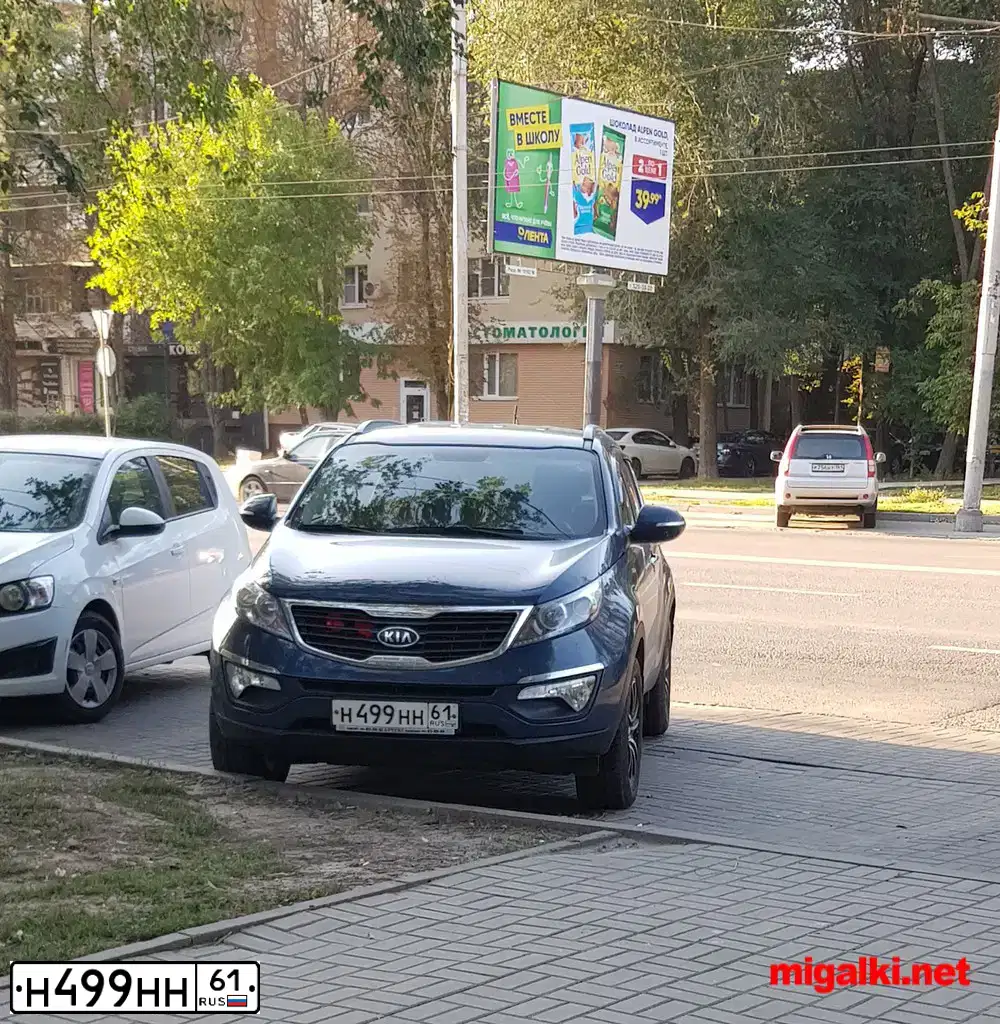 Фото автомобиля KIA SPORTAGE, 2012 — госномер Н499НН61. Цвет: синий