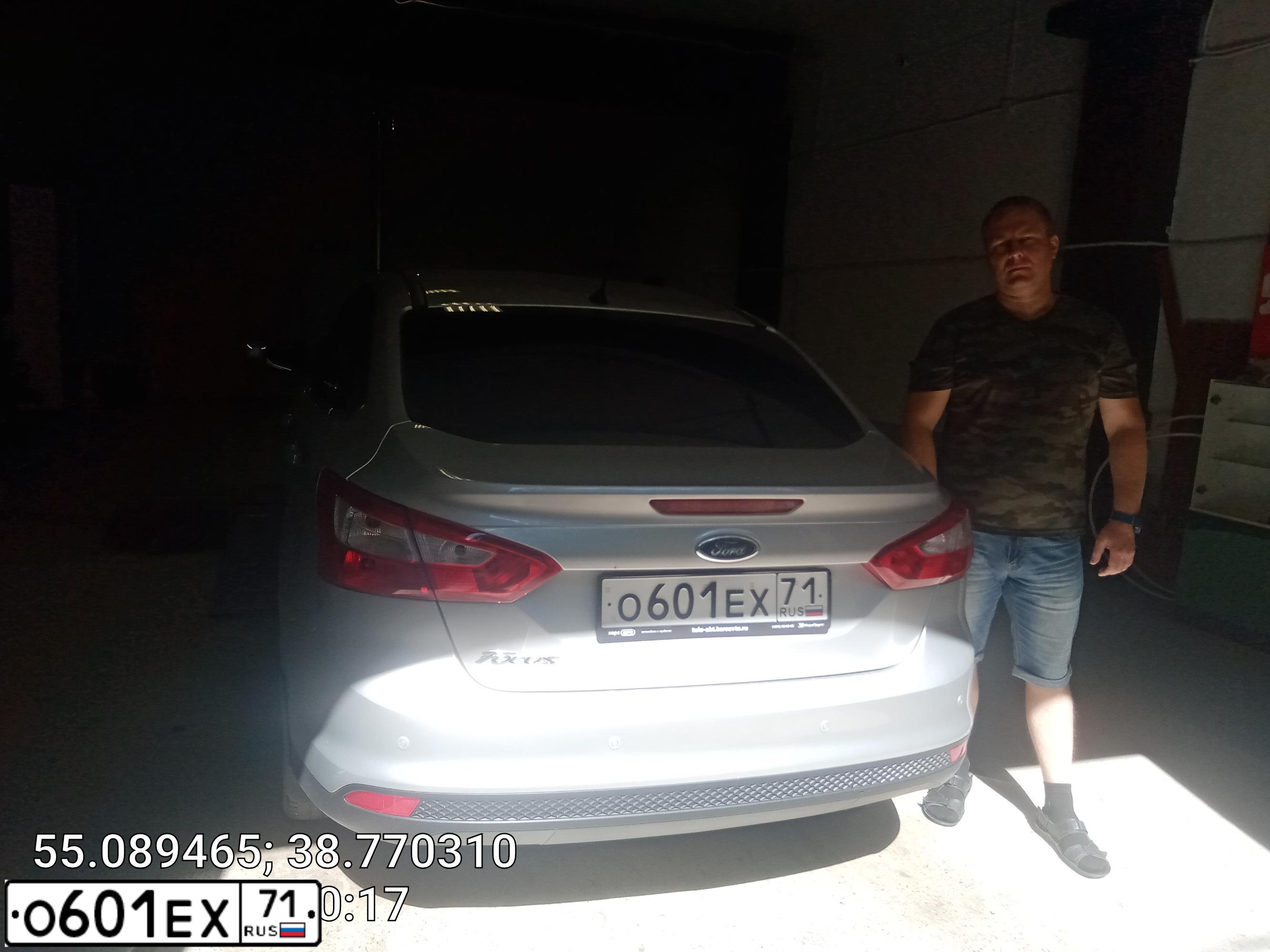 Фото автомобиля FORD FOCUS, 2012 — госномер Е008СУ71. Цвет: Серебристый