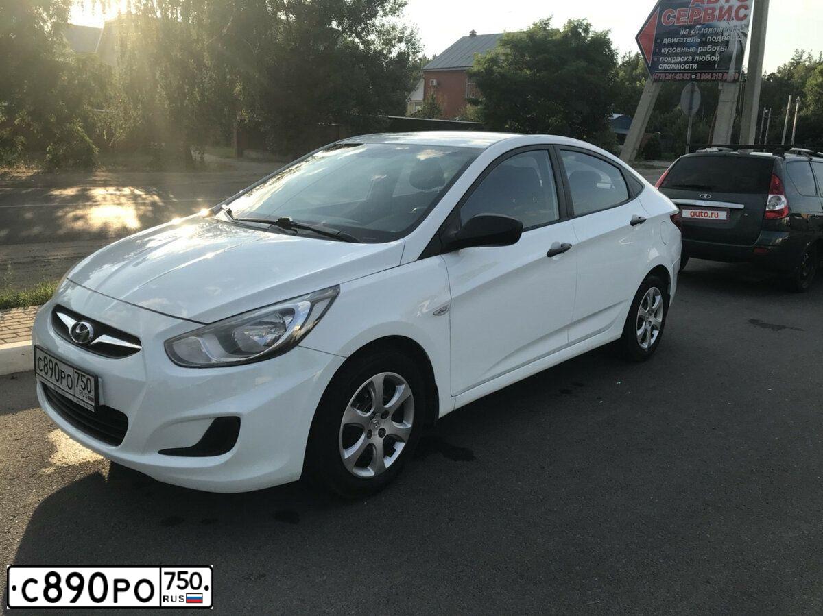 Фото автомобиля HYUNDAI SOLARIS, 2014 — госномер Е970МВ164. Цвет: Белый