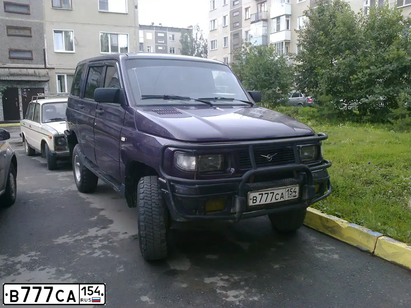 Фото автомобиля UAZ 3162 SIMBIR, 2001 — госномер Р687ВК154. Цвет: БАКЛАЖАН