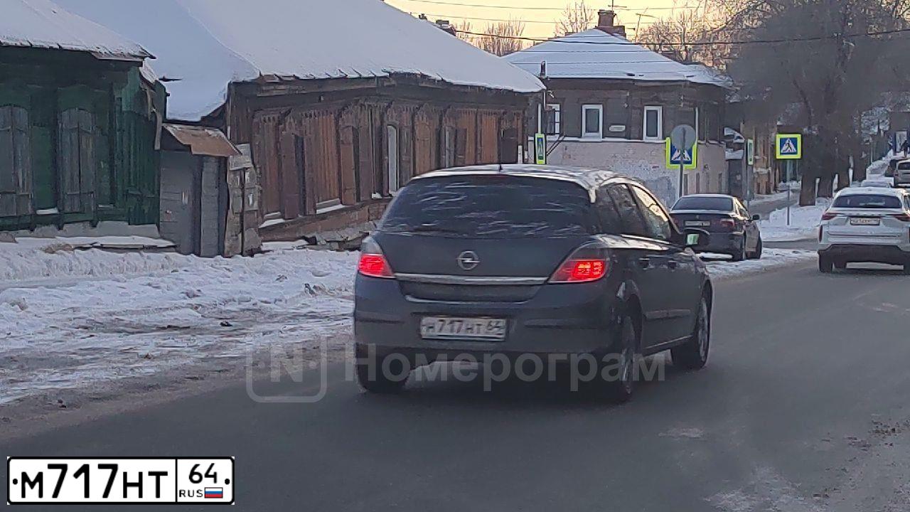 Фото автомобиля FORD FIESTA / ASPIRE, 2006 — госномер А605ХО01. Цвет: ЧЕРНЫЙ