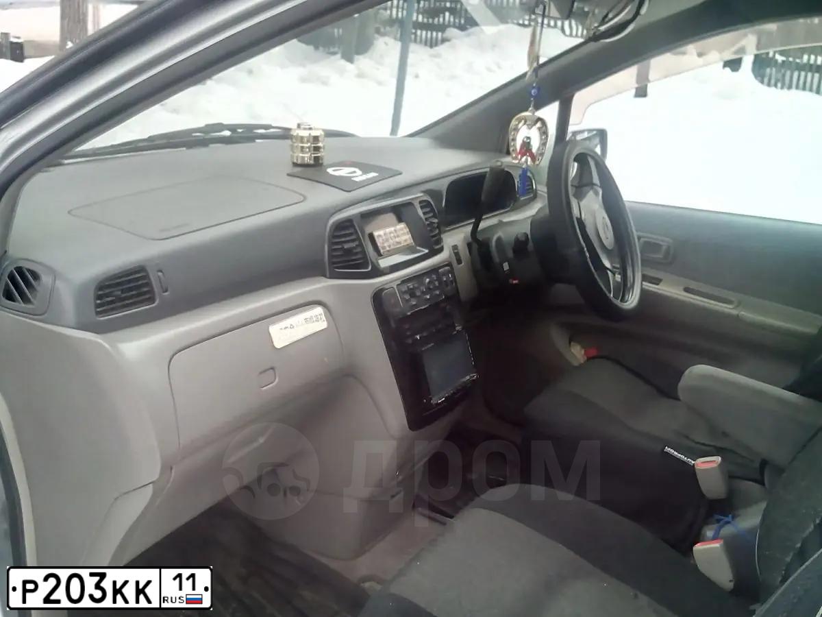 Фото автомобиля LADA XRAY, 2018 — госномер Р203КК11. Цвет: ТЕМНО-КОРИЧНЕВЫЙ