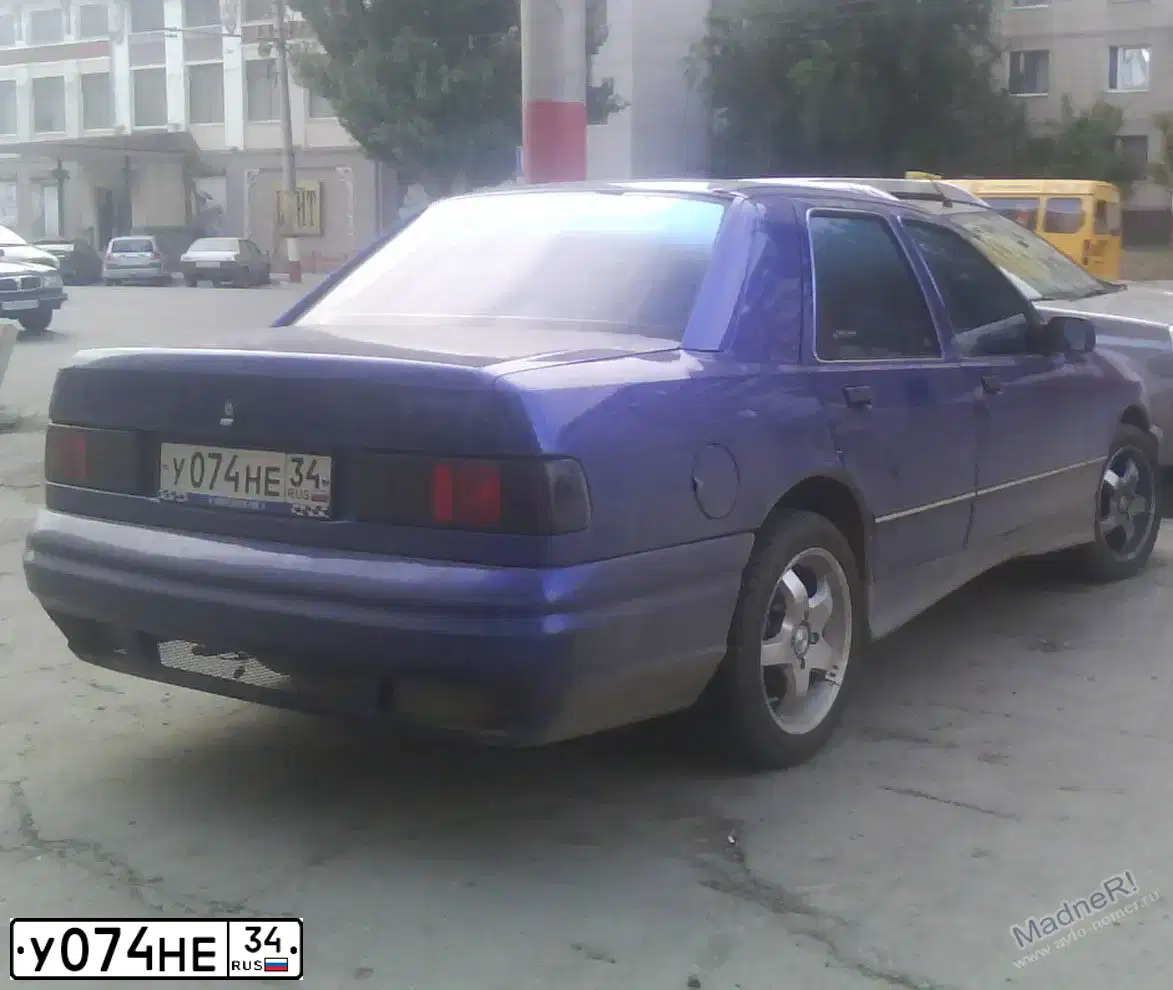 Фото автомобиля FORD ФОРД СИЕРРА, 1987 — госномер У074НЕ34. Цвет: ТЕМНО СИНИЙ