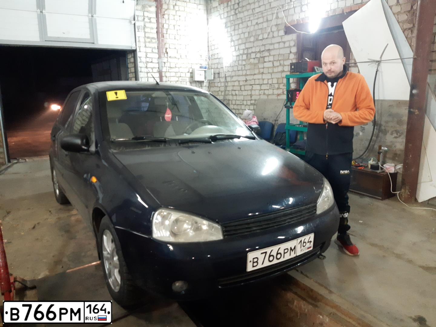 Фото автомобиля LADA KALINA, 2008 — госномер К163СТ164. Цвет: ТЕМНЫЙ СИНЕ-ФИОЛЕТОВЫЙ
