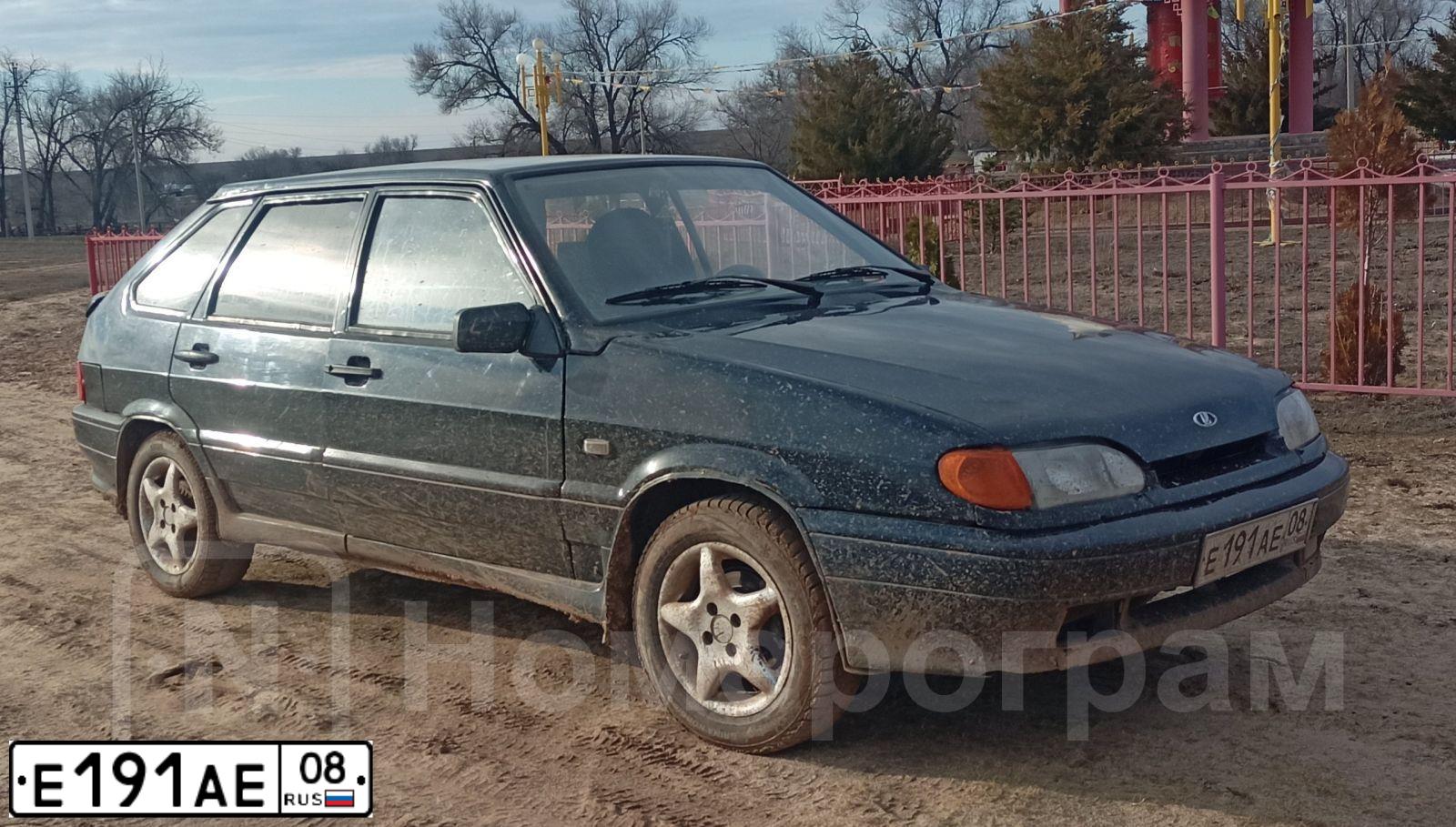 Фото автомобиля LADA 2114 SAMARA, 2006 — госномер Е191АЕ08. Цвет: ГРАФИТОВЫЙ МЕТ.