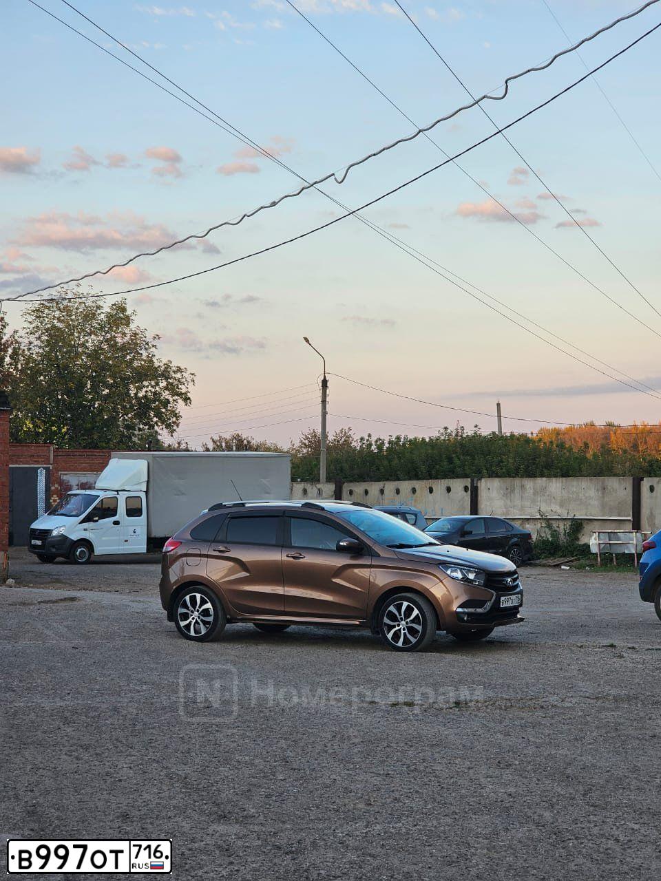 Фото автомобиля LADA XRAY, 2017 — госномер В997ОТ716. Цвет: СВЕТЛО-КОРИЧНЕВЫЙ
