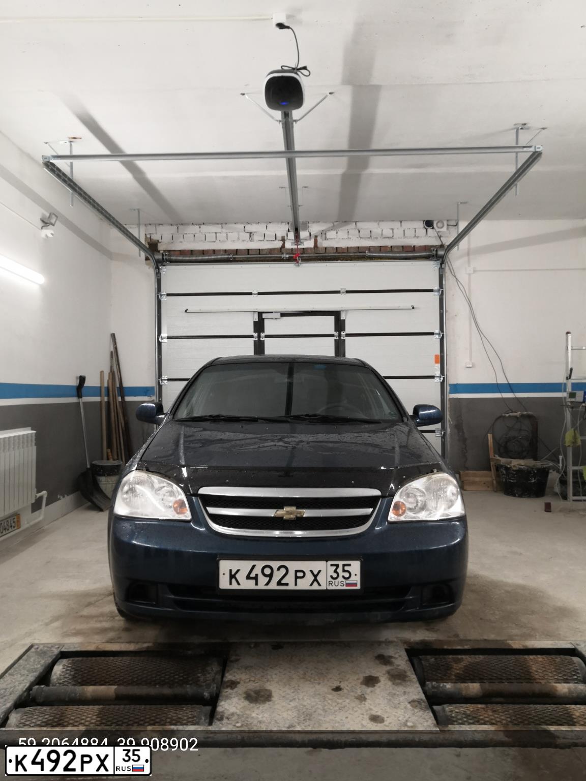 Фото автомобиля CHEVROLET LACETTI, 2008 — госномер К492РХ35. Цвет: синий
