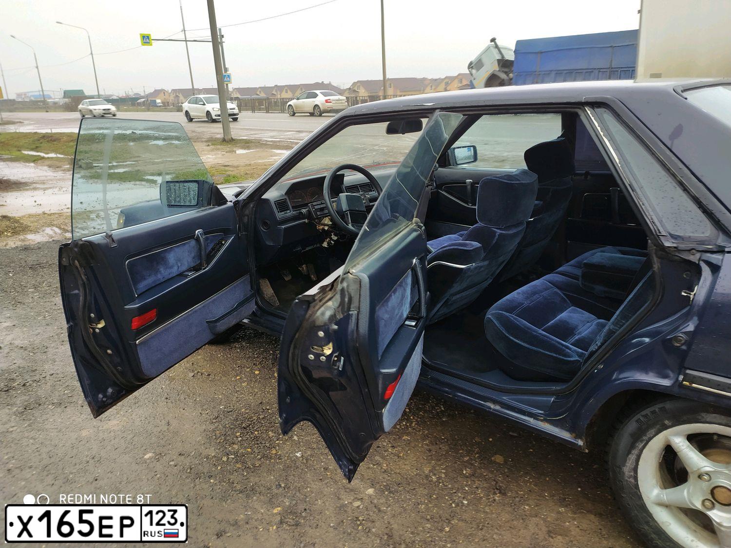 Фото автомобиля MITSUBISHI SAPPORO, 1988 — госномер Х165ЕР123. Цвет: СИНИЙ