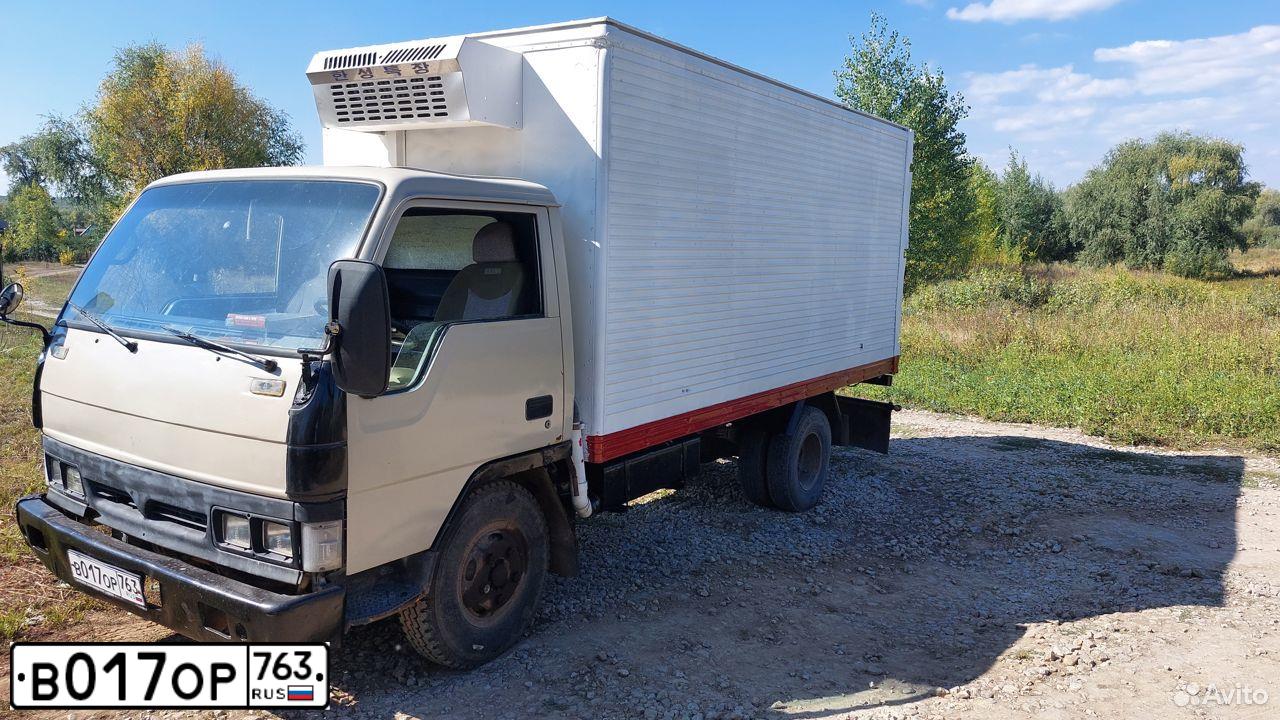 Фото автомобиля HYUNDAI HD-SERIE, 1998 — госномер В017ОР763. Цвет: Белый