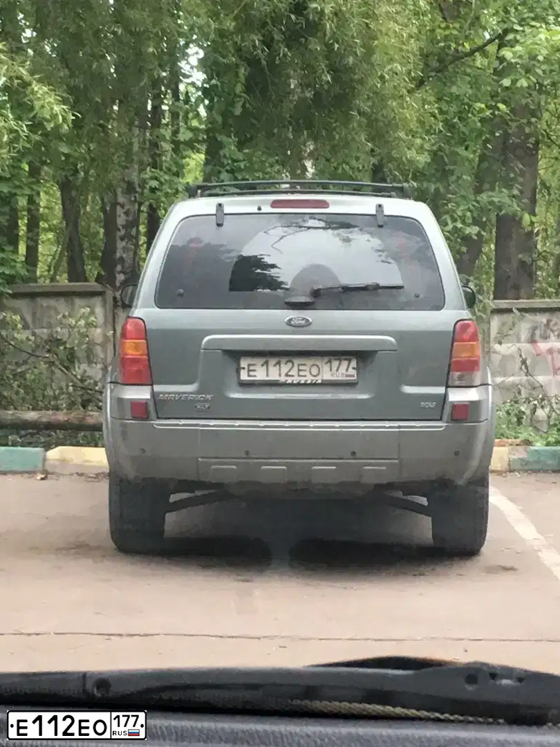 Фото автомобиля FORD MAVERICK, 2005 — госномер Е112ЕО177. Цвет: СЕРО-ЗЕЛЕНЫЙ