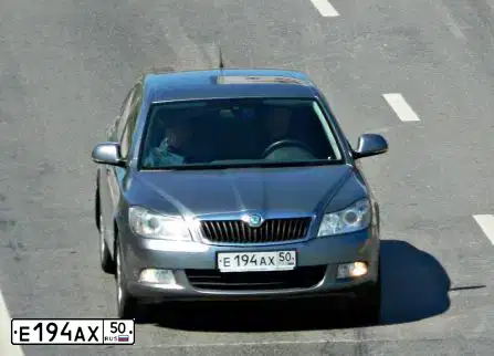 Фото автомобиля SKODA OCTAVIA, 2013 — госномер Е194АХ50. Цвет: Серый
