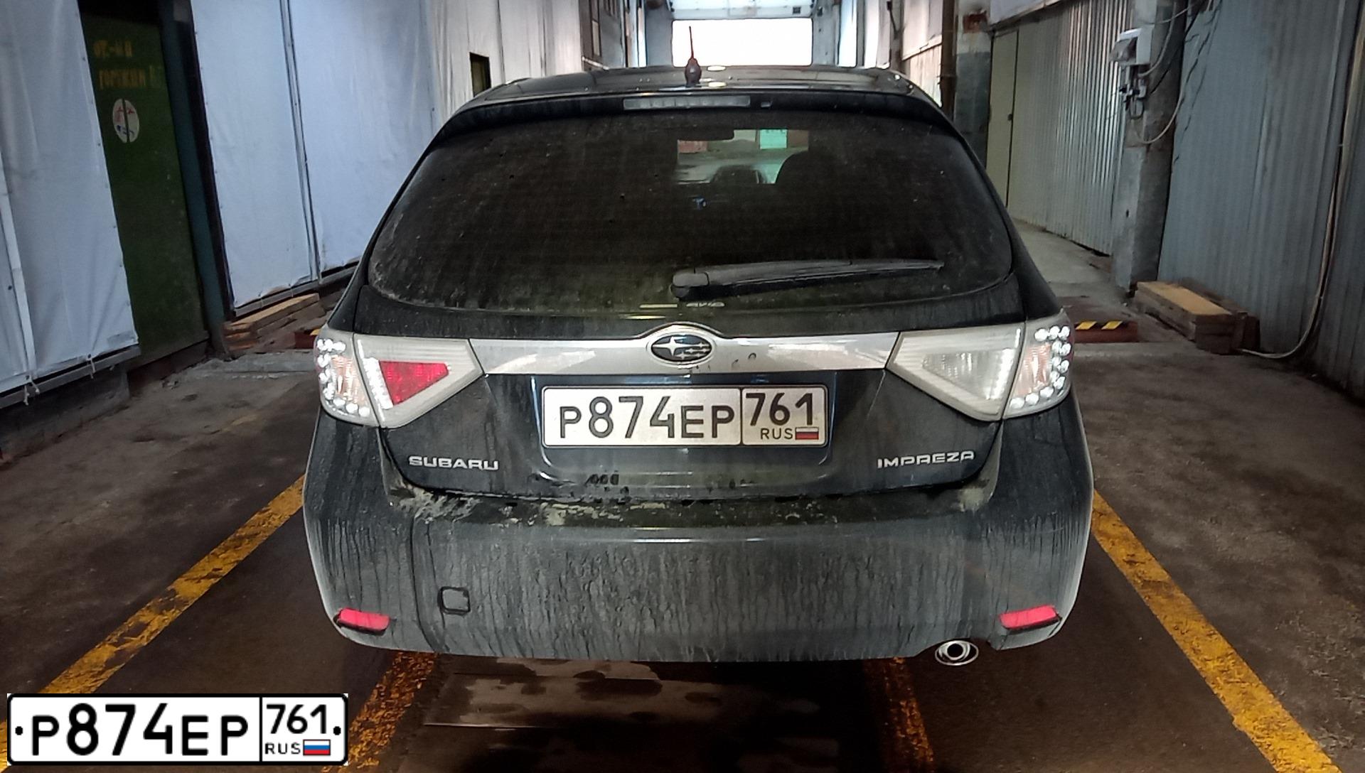 Фото автомобиля SUBARU IMPREZA, 2008 — госномер О571АС761. Цвет: ЧЕРНЫЙ