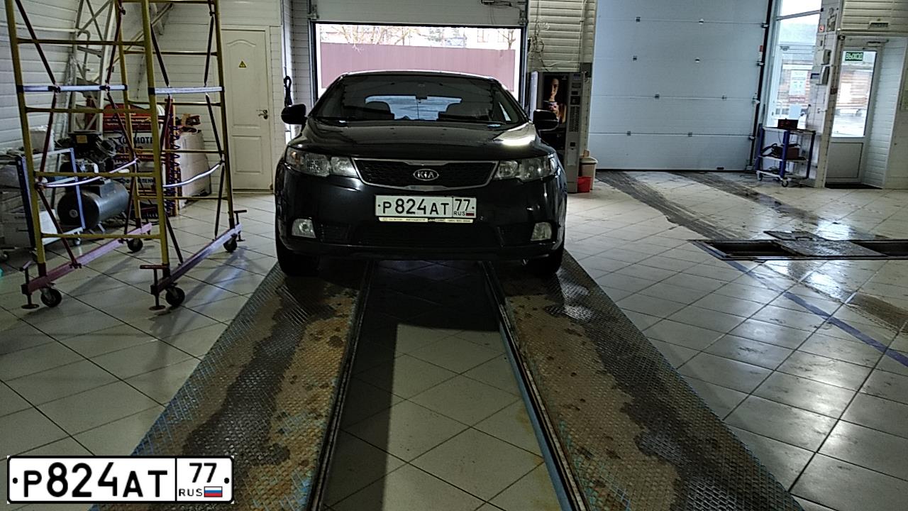 Фото автомобиля KIA CERATO, 2012 — госномер Т199УЕ69. Цвет: ЧЕРНЫЙ
