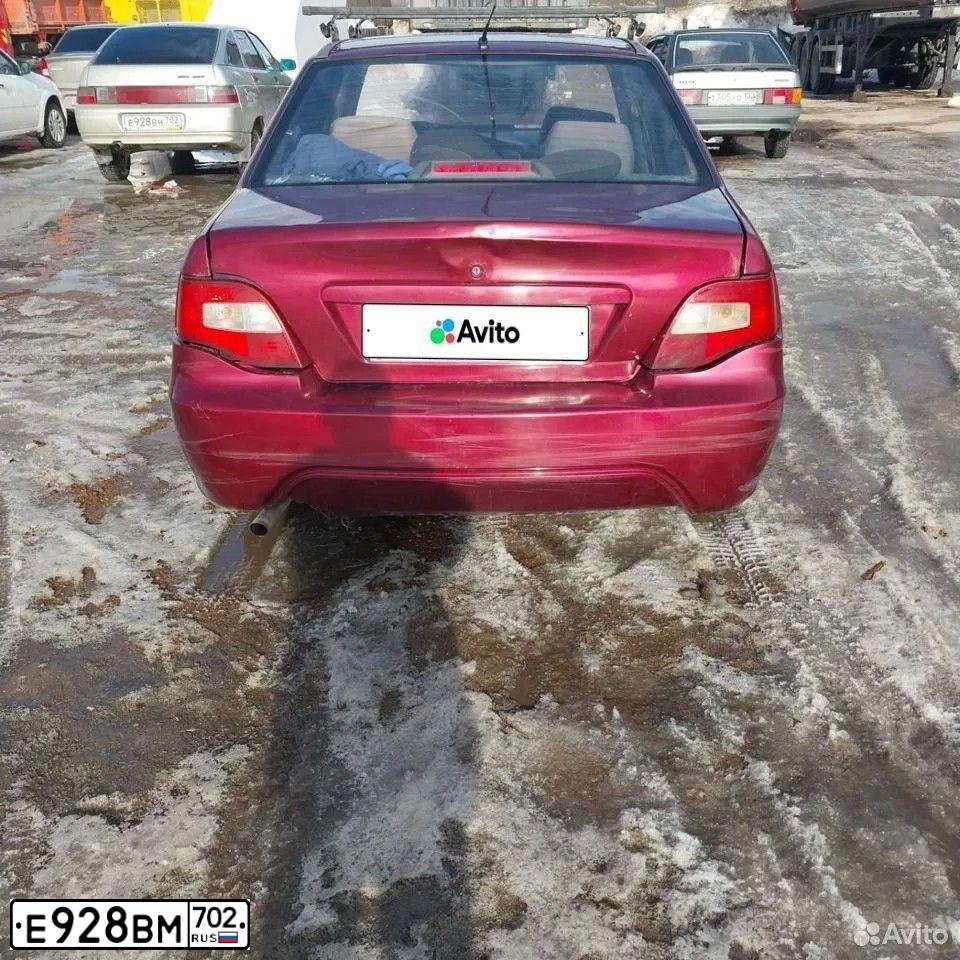 Фото автомобиля LADA 2115 SAMARA, 2009 — госномер Е928ВМ702. Цвет: Серо-сине-зеленый