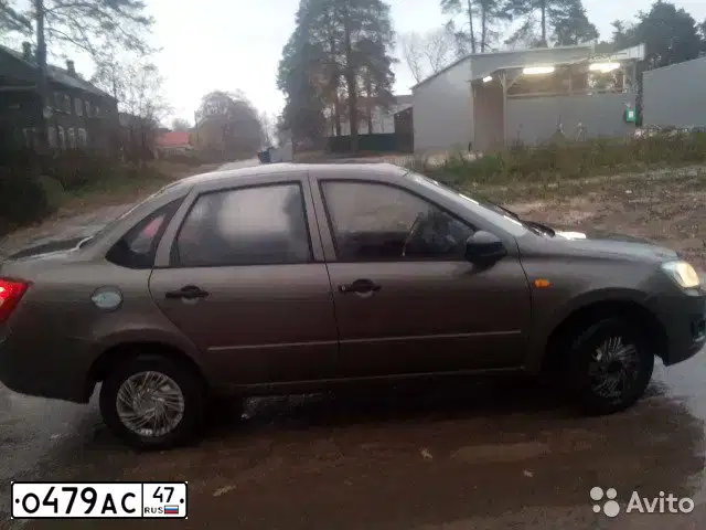 Фото автомобиля LADA 2190 GRANTA, 2015 — госномер О479АС47. Цвет: Золотисто-коричневый