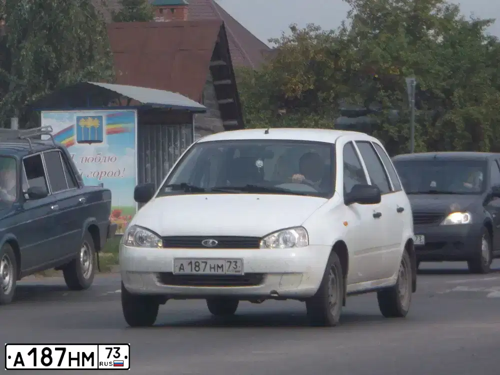 Фото автомобиля LADA 1117 KALINA, 2012 — госномер А187НМ73. Цвет: БЕЛЫЙ
