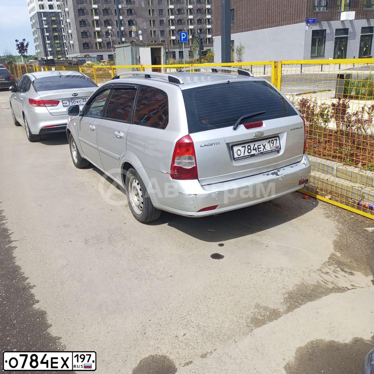 Фото автомобиля CHEVROLET LACETTI, 2010 — госномер О784ЕХ197. Цвет: СЕРЫЙ