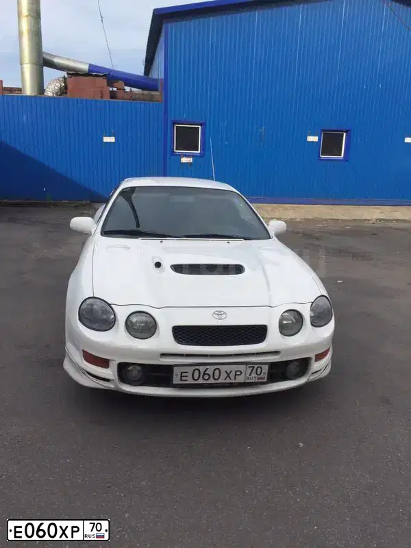 Фото автомобиля TOYOTA CELICA, 1993 — госномер О113ХУ77. Цвет: БЕЛЫЙ