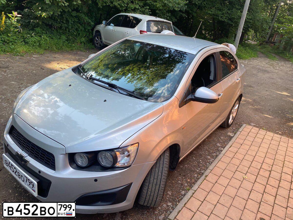 Фото автомобиля CHEVROLET AVEO, 2012 — госномер В452ВО799. Цвет: СЕРЕБРИСТЫЙ