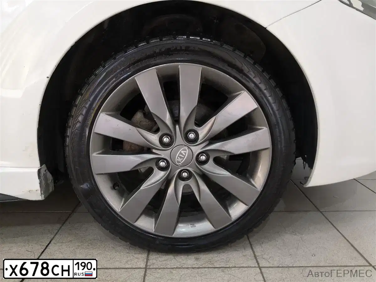 Фото автомобиля KIA CERATO, 2011 — госномер С412ХХ123. Цвет: Белый