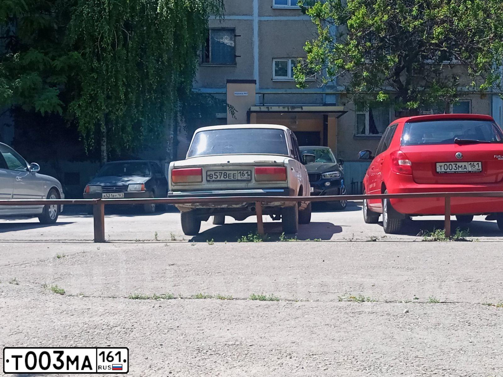 Фото автомобиля SKODA FABIA, 2010 — госномер Т003МА161. Цвет: КРАСНЫЙ