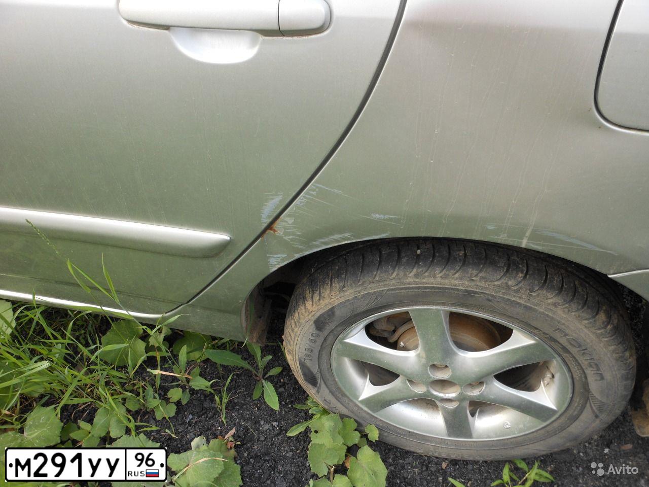 Фото автомобиля TOYOTA COROLLA, 2005 — госномер М291УУ96. Цвет: СВЕТЛО-СЕРЫЙ