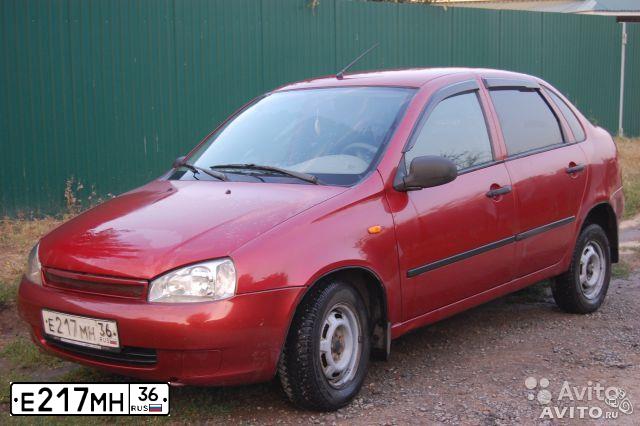 Фото автомобиля LADA 1118 KALINA, 2006 — госномер Е217МН36. Цвет: СЕРЕБРИСТО-КРАСНЫЙ