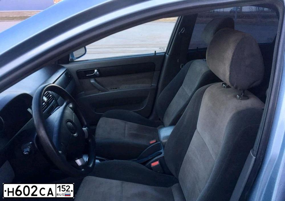 Фото автомобиля DAEWOO GENTRA, 2014 — госномер Н602СА152. Цвет: СЕРО-ГОЛУБОЙ