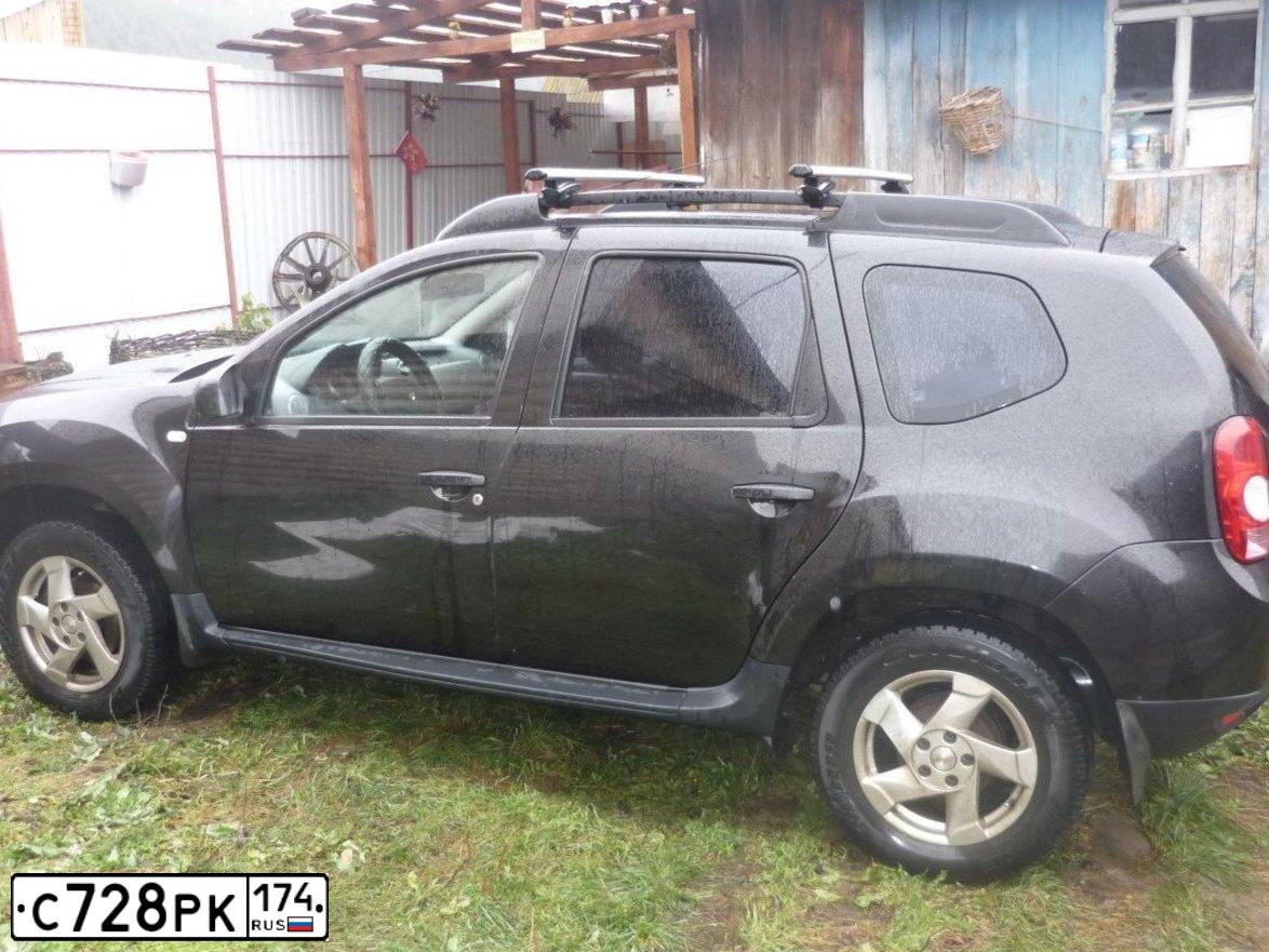 Фото автомобиля RENAULT DUSTER, 2012 — госномер С728РК174. Цвет: ЧЕРНЫЙ