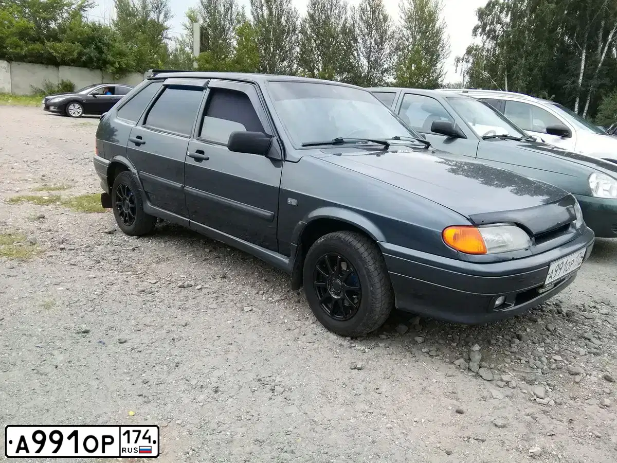 Фото автомобиля LADA 2114 SAMARA, 2012 — госномер А991ОР174. Цвет: СЕРО-СИНИЙ