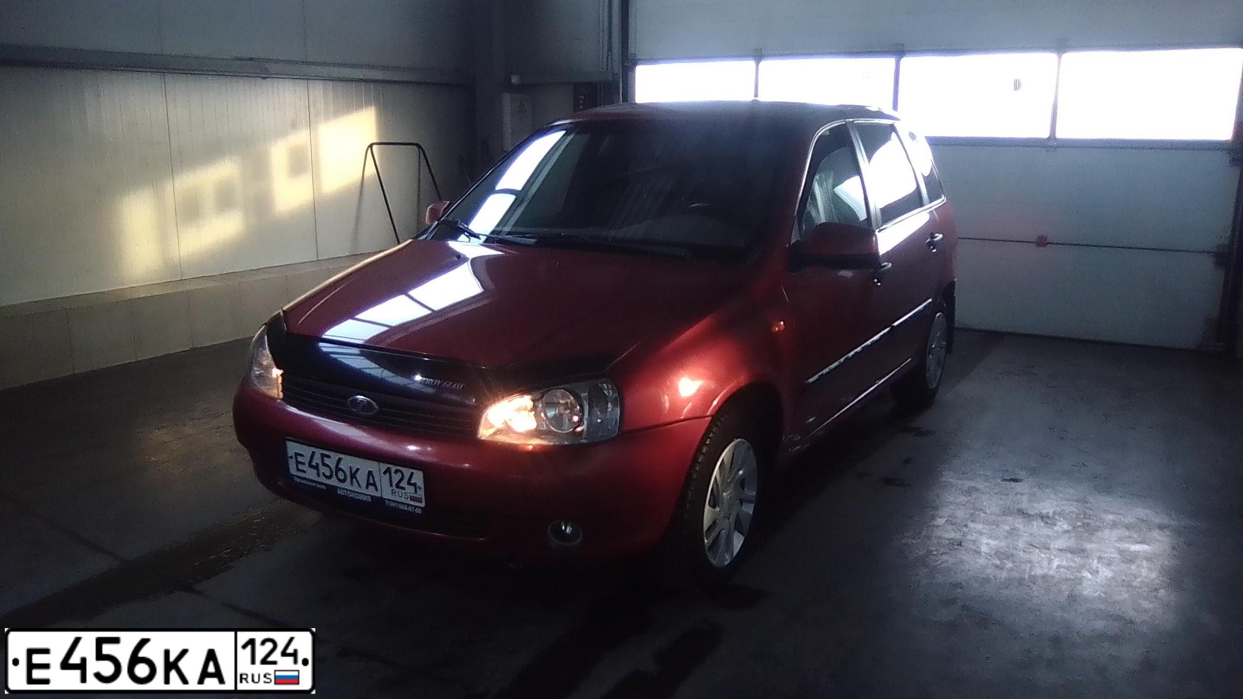 Фото автомобиля LADA 1117 KALINA, 2012 — госномер Е456КА124. Цвет: Серый