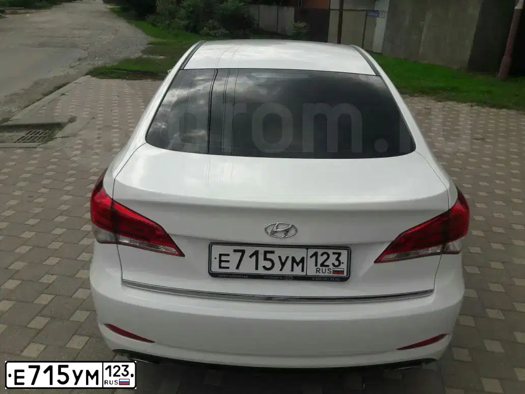Фото автомобиля HYUNDAI I40, 2016 — госномер Е715УМ123. Цвет: БЕЛЫЙ