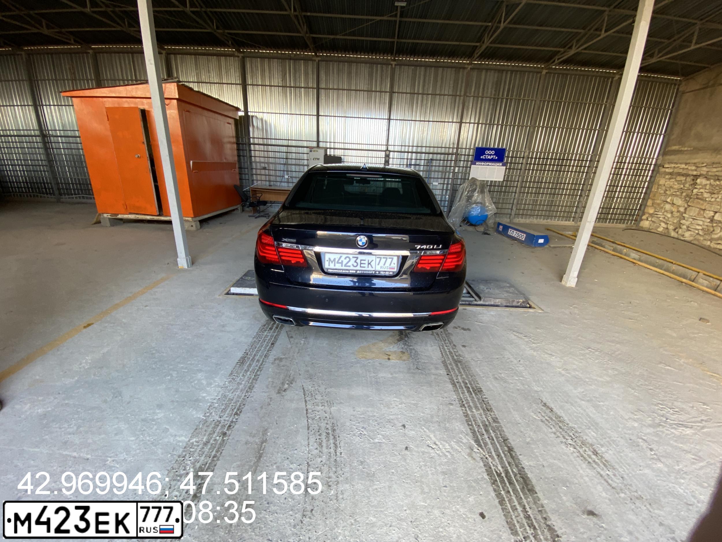 Фото автомобиля BMW SERIE 7, 2013 — госномер М423ЕК777. Цвет: ЧЕРНЫЙ