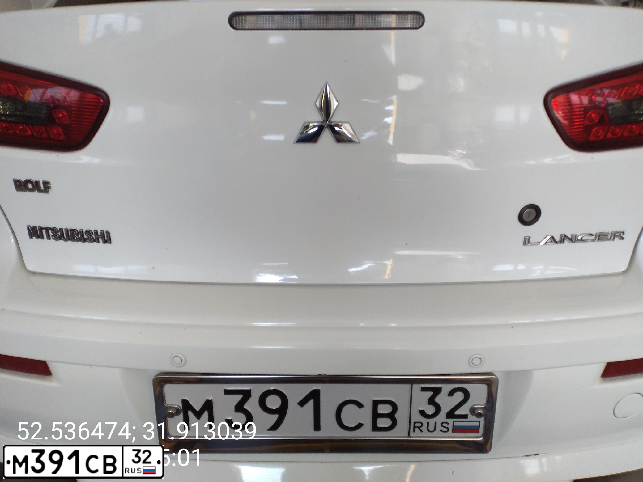 Фото автомобиля MITSUBISHI LANCER, 2008 — госномер М391СВ32. Цвет: Белый