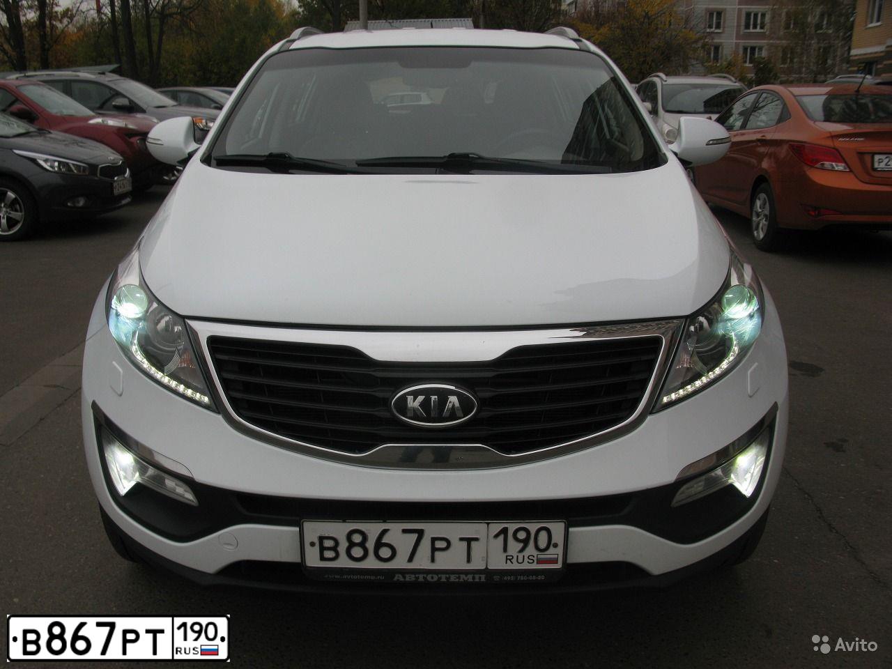 Фото автомобиля KIA SPORTAGE, 2012 — госномер Е010СО777. Цвет: БЕЛЫЙ
