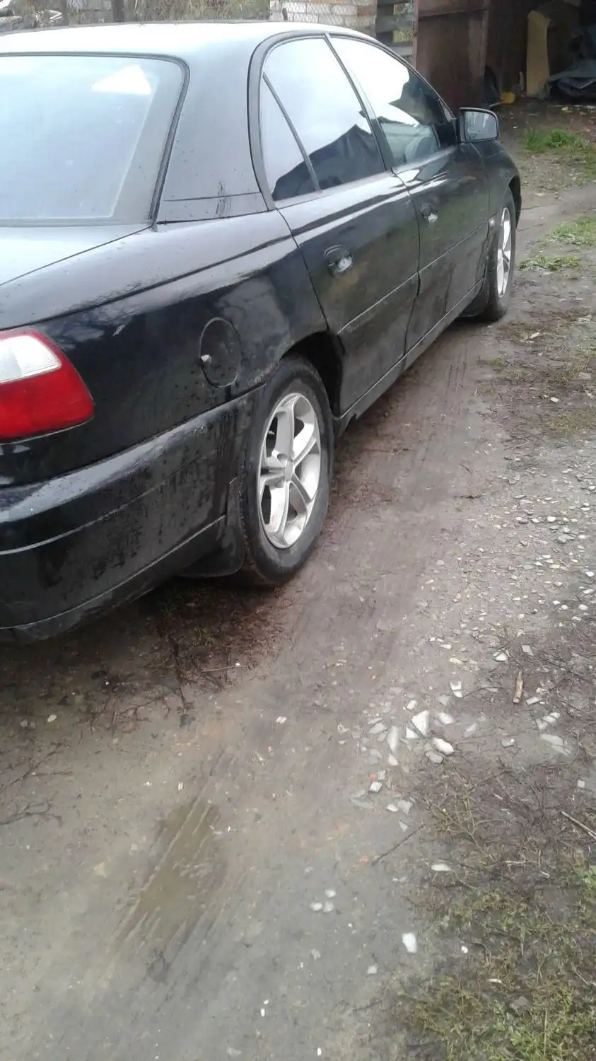 Фото автомобиля OPEL OMEGA, 2003 — госномер Е193РТ186. Цвет: ЧЕРНЫЙ