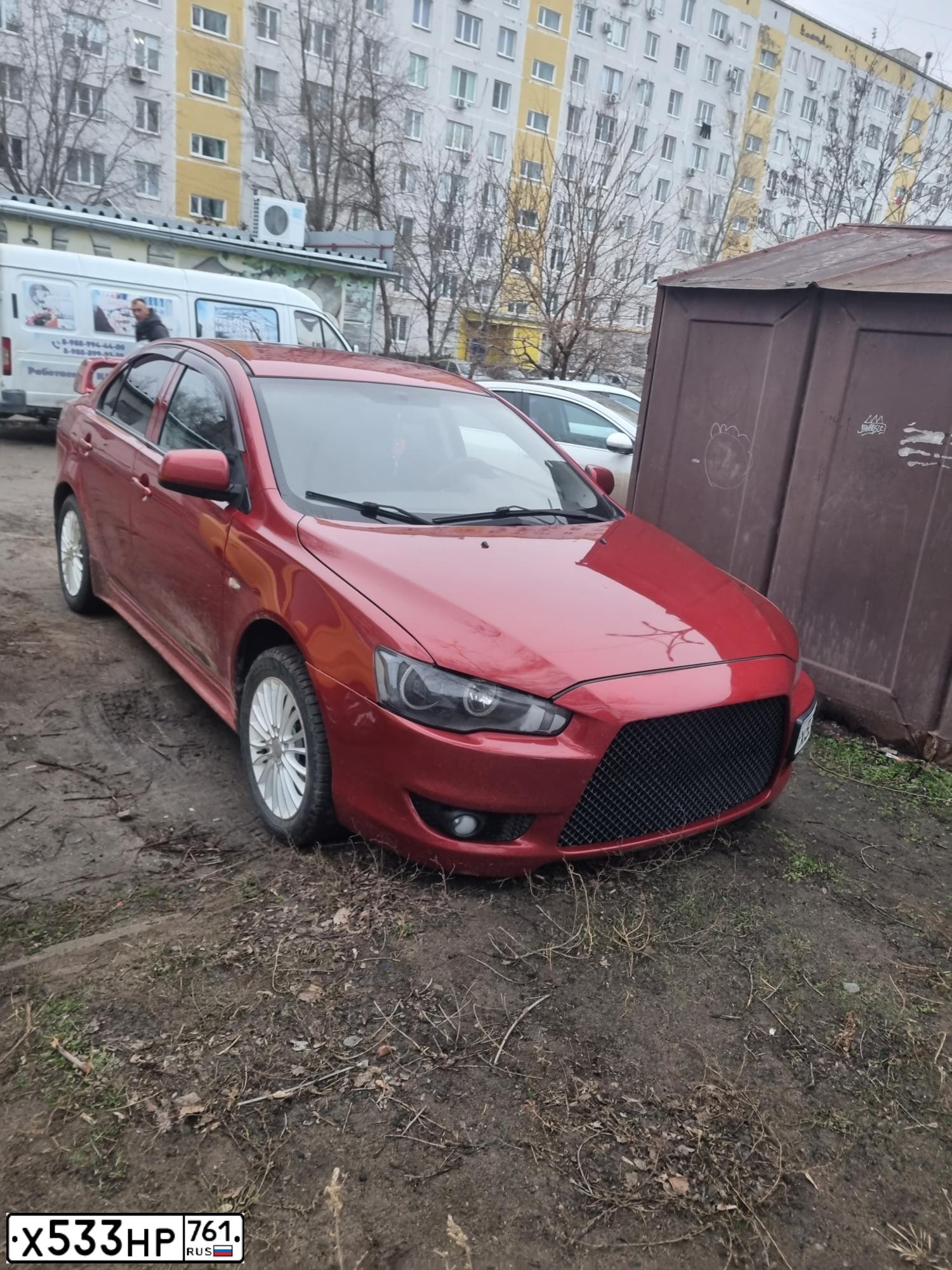 Фото автомобиля MITSUBISHI LANCER, 2007 — госномер Х533НР761. Цвет: Красный